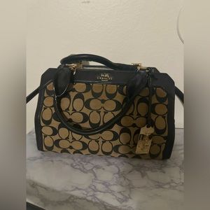 BROWN AND BLACK COACH PURSE
